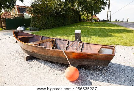 The Old Boat And Houses In The Traditional Old Fisherman Village Open-air Museum Of Zuiderzee (zuide