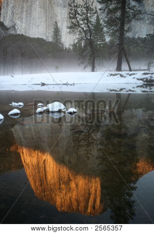 Fog Surrounding El Capital Reflection In Merced