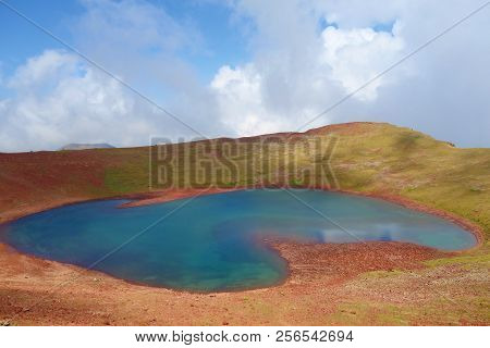 Colorful And Breathtaking View At The Top Of Azhdahak Volcano With A Turquoise Lake Hidden Inside In