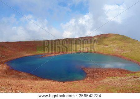 Colorful And Breathtaking View At The Top Of Azhdahak Volcano With A Turquoise Lake Hidden Inside In