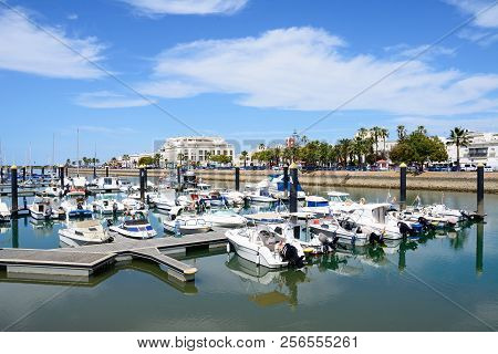 Ayamonte, Spain - June 11, 2017 - Motor Boats Moored In The Marina (puerto Ayamonte) With Town Build