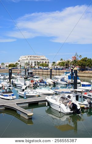 Ayamonte, Spain - June 11, 2017 - Motor Boats Moored In The Marina (puerto Ayamonte) With Town Build