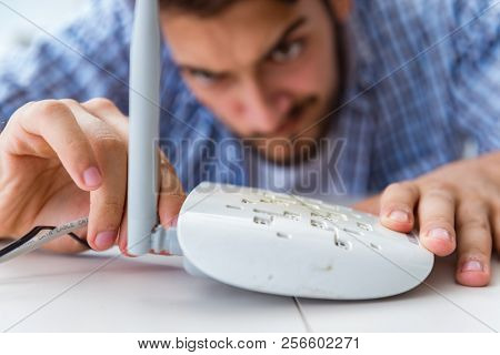 Frustrated young man due to weak internet reception
