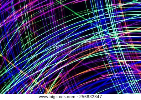 Multi Color Light Painting, Long Exposure Photography, Abstract Lines Of Color Against A Black Backg