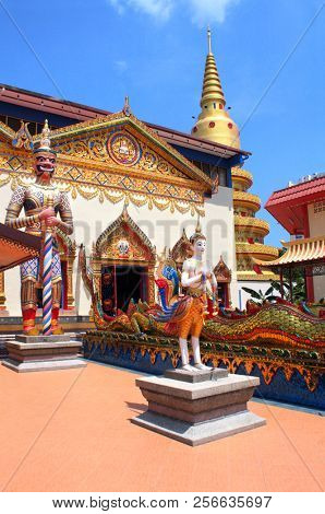 Statues of kinnaris and snakes-nagas Pavilion in Pulau Tikus, thai Buddhist temple (Wat Chayamangkalaram), famous tourist attraction in Georgetown, Penang island, Malaysia