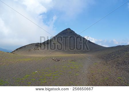 Top Of Chaukhi Mountain Pass On A Hiking Trail Leading From Juta To Roshka In Caucasus Mountains