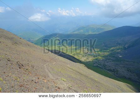 Top Of Chaukhi Mountain Pass On A Hiking Trail Leading From Juta To Roshka In Caucasus Mountains