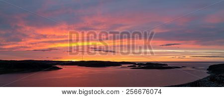 Colorful Dramatic Play Of Light And Shadows At The Sunset Over The Kola Peninsula And Barents Sea, R