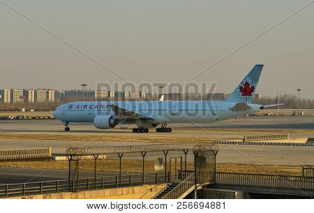 Passenger Airplane Docking At The Airport