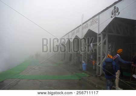 Chamoli District, Uttarakhand, India, June 2018, Tourist And Visitors At Hemkund Sahib In A Misty Mo