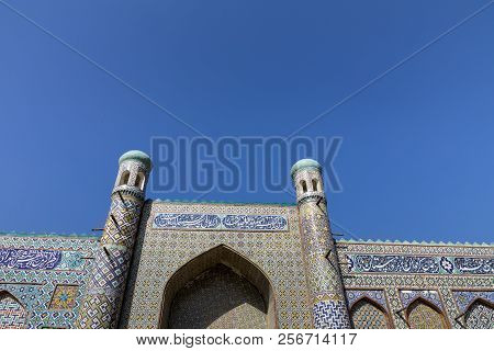 Khan's Palace In Kokand. Uzbekistan. Ancient Palace With Facades Of Colored Mosaic. The Main Entranc