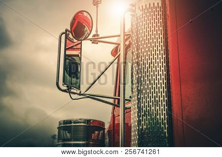Semi Truck Driving Theme. Outside Mirrors Closeup. Transportation Industry.
