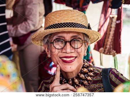 Moscow, Park On Krasnaya Presnya, August 05, 2018: Elderly Woman From Indonesia Wearing Glasses And 