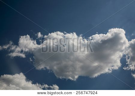 Unrestrained And Fast Clouds Tend To Distance The Sunny Sky