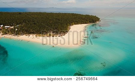 Aerial View Of Beautiful Tropical Island Daco With White Sand Beach. View Of A Nice Tropical Beach F