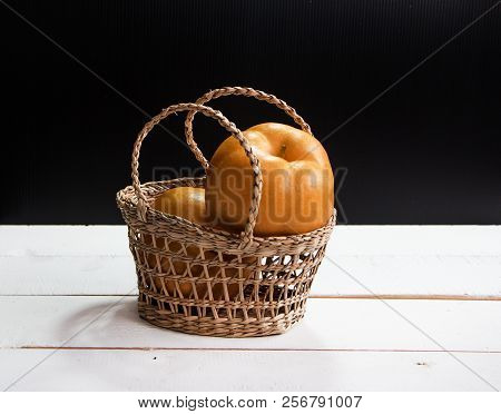 The Chinese Pear Put In Woven Basket,on Timber Baord