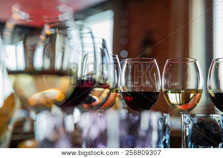 Glasses With Alcoholic Drinks In A Restaurant
