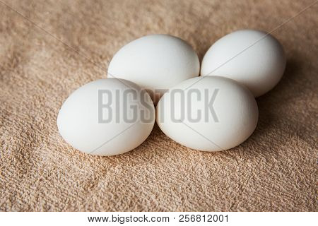 White Chicken Eggs On Brown Tablecloth On A Table