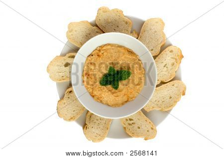 Dip de hummus con rebanadas de pan