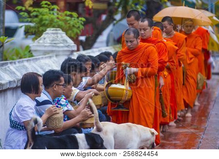 Luang Prabang , Laos - Aug 11 2018 : Buddhist Alms Giving Ceremony In Luang Prabang Laos On August 1