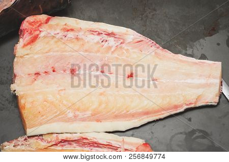 Pintado Fish Fillet. Brazilian Pintado Fish, White Meat, Leather Fish With Rounded Black Spots On Th