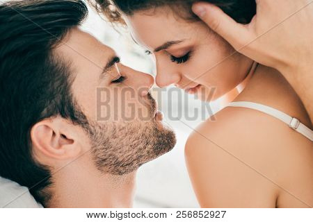 Close-up View Of Seductive Young Couple Able To Kiss In Foreplay