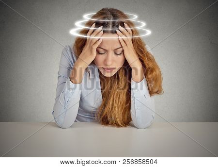 Woman With Vertigo. Young Female Patient Suffering From Dizziness.