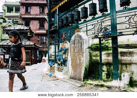 Kathmandu Nepal August 24, 2018 View Of A Nepali Child Playing Around The Shree Gha Stupa Temple Loc