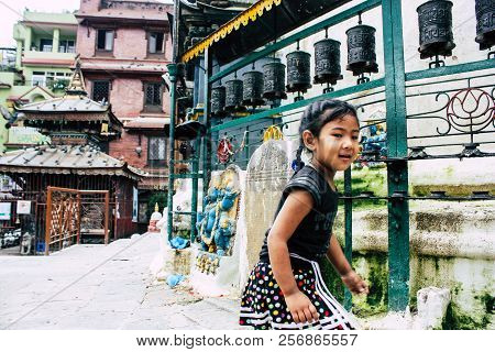 Kathmandu Nepal August 24, 2018 View Of A Nepali Child Playing Around The Shree Gha Stupa Temple Loc