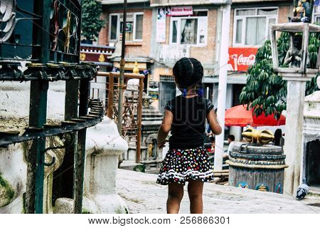 Kathmandu Nepal August 24, 2018 View Of A Nepali Child Playing Around The Shree Gha Stupa Temple Loc
