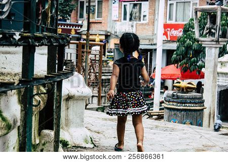 Kathmandu Nepal August 24, 2018 View Of A Nepali Child Playing Around The Shree Gha Stupa Temple Loc