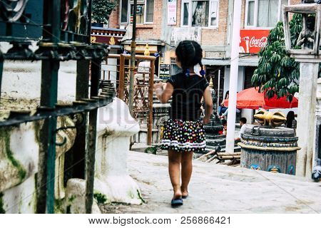 Kathmandu Nepal August 24, 2018 View Of A Nepali Child Playing Around The Shree Gha Stupa Temple Loc