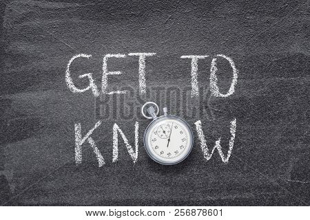 Get To Know Phrase Written On Chalkboard With Vintage Stopwatch Used Instead Of O