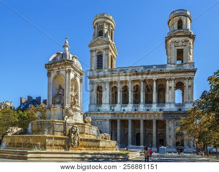 Church Saint-sulpice Is A Roman Catholic Church In Paris, France. View Of Facade With Fountain