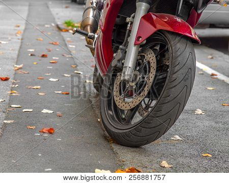Large Motorcycle Leaning On Its Stand In The City