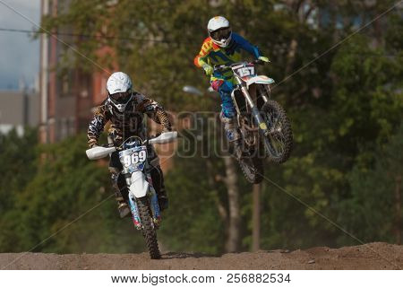 ST. PETERSBURG, RUSSIA - SEPTEMBER 2, 2018: Athletes compete in third stage of Russian Supercross Championship. This stage is held on the motor racing track of DOSAAF in Saint Petersburg