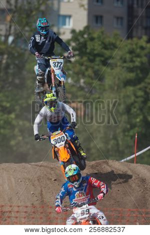 ST. PETERSBURG, RUSSIA - SEPTEMBER 2, 2018: Athletes compete in third stage of Russian Supercross Championship. This stage is held on the motor racing track of DOSAAF in Saint Petersburg