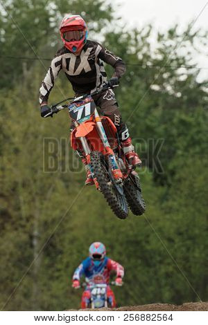 ST. PETERSBURG, RUSSIA - SEPTEMBER 2, 2018: Athletes compete in third stage of Russian Supercross Championship. This stage is held on the motor racing track of DOSAAF in Saint Petersburg
