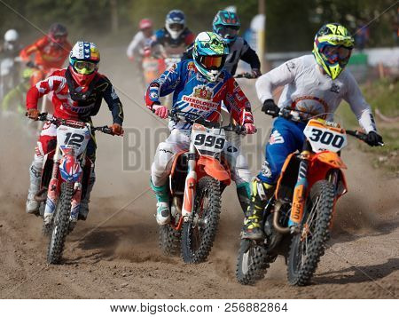 ST. PETERSBURG, RUSSIA - SEPTEMBER 2, 2018: Athletes compete in third stage of Russian Supercross Championship. This stage is held on the motor racing track of DOSAAF in Saint Petersburg