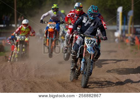 ST. PETERSBURG, RUSSIA - SEPTEMBER 2, 2018: Athletes compete in third stage of Russian Supercross Championship. This stage is held on the motor racing track of DOSAAF in Saint Petersburg