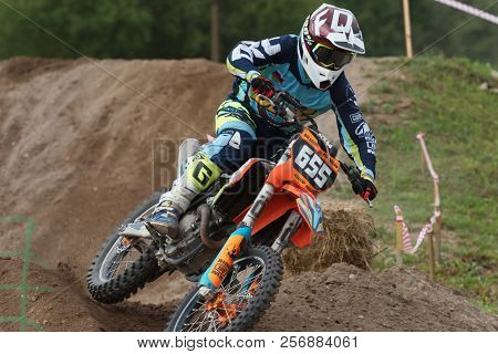ST. PETERSBURG, RUSSIA - SEPTEMBER 2, 2018: Athletes compete in third stage of Russian Supercross Championship. This stage is held on the motor racing track of DOSAAF in Saint Petersburg