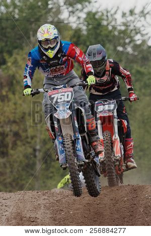 ST. PETERSBURG, RUSSIA - SEPTEMBER 2, 2018: Athletes compete in third stage of Russian Supercross Championship. This stage is held on the motor racing track of DOSAAF in Saint Petersburg