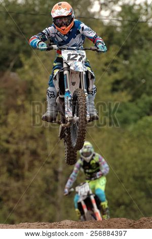 ST. PETERSBURG, RUSSIA - SEPTEMBER 2, 2018: Athletes compete in third stage of Russian Supercross Championship. This stage is held on the motor racing track of DOSAAF in Saint Petersburg
