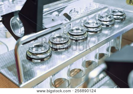 Abstract Background With Gray Glass Tubes. Detail Of A Soxhlet Extractor. Chemical Laboratory Equipm