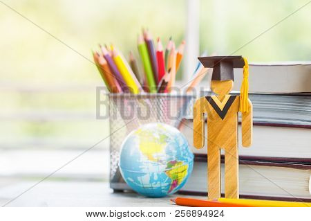 America Education Knowledge Learning Study Abroad International Ideas. People Sign Wood With Graduat