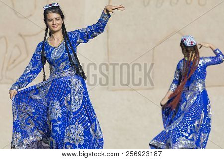 Khiva, Uzbekistan - August 26, 2018: Folk Dancers Performs Traditional Dance At Local Festivals.
