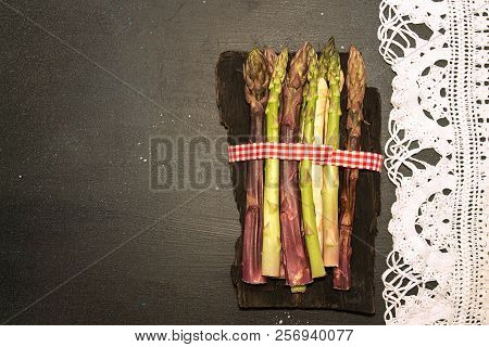 Purple Green White Asparagus Flat Lay On Black Stone Background. Vegetarian Dieting Organic Healthy