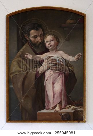 HINTERBRAND, GERMANY - JULY 04: Saint Joseph holding child Jesus, altarpiece in chapel in Hinterbrand, Germany on July 04, 2017.