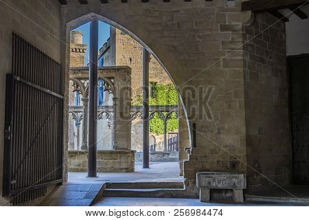Passage And Old Buildings Medieval Town Of Olite In The Background You Can See The City Walls. Navar