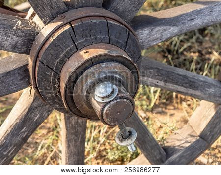 A Fragment Of An Old Wheel Made Of Wood
